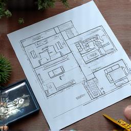 Innenraumplanung mit Architekturplänen und Computermodellen